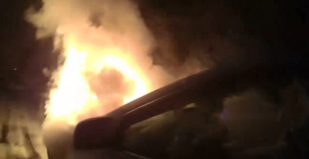 Spokane Police officer saves woman from burning